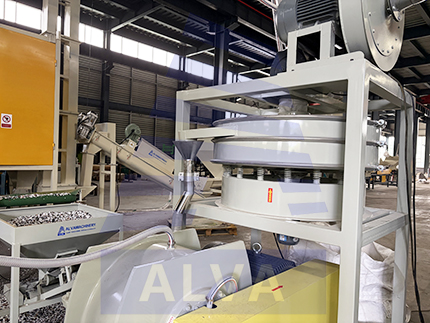 The ALVA Grinding & Storage System with Bag Filter functions as the final size-reduction, storage and dust control device in plastic waste processing workflows. It takes purified plastic materials from upstream equipment. It processes the materials into particles of consistent size. It stores the finished plastic particles for later handling. The bag filter receives dust-laden air from the grinding process. It removes dust particles from the air stream. It releases filtered air back to the environment. It completes the material processing cycle. It maintains air quality in the production area. It is designed to integrate with other equipment in the line. It meets the operational and environmental requirements of automated plastic recycling systems.